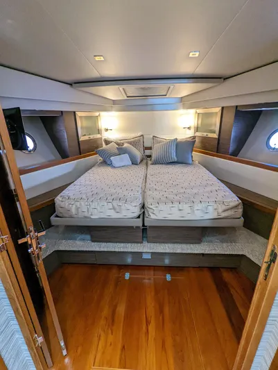 Sapphire Yacht Photos Pics 2020 Tiara Yachts F53 Flybridge cabin with twin beds and elegant interior design.