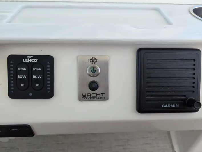Sapphire Yacht Photos Pics Control panel of 2020 Tiara Yachts F53 Flybridge with Lenco, Yacht Controller, and Garmin.