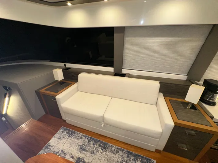 Sapphire Yacht Photos Pics Luxurious interior of 2020 Tiara Yachts F53 Flybridge with modern furnishings and elegant lighting.