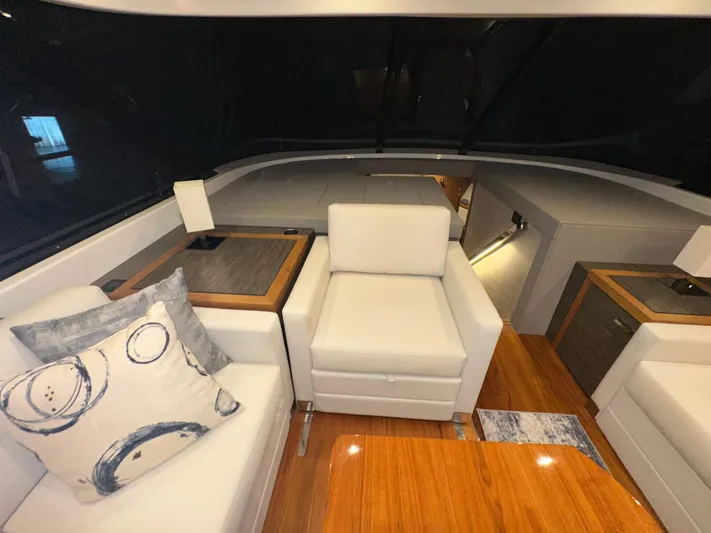 Sapphire Yacht Photos Pics Luxurious interior of 2020 Tiara Yachts F53 Flybridge with elegant seating and modern design.