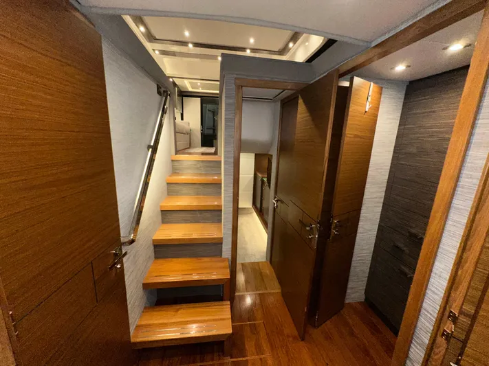 Sapphire Yacht Photos Pics Interior of 2020 Tiara Yachts F53 Flybridge with wooden stairs and modern design.