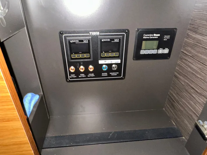 Sapphire Yacht Photos Pics Control panel of a 2020 Tiara Yachts F53 Flybridge with Cummins Onan Marine Generator.