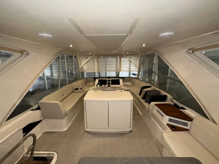 Sapphire Yacht Photos Pics Luxurious interior of 2020 Tiara Yachts F53 Flybridge with elegant seating and modern design.