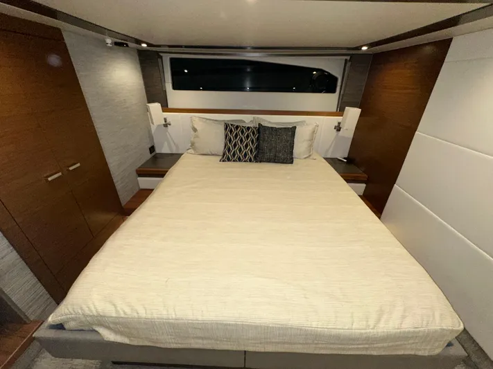 Sapphire Yacht Photos Pics Luxurious bedroom interior of 2020 Tiara Yachts F53 Flybridge with modern design.