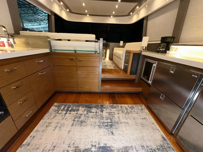 Sapphire Yacht Photos Pics Luxurious interior of 2020 Tiara Yachts F53 Flybridge with modern kitchen and elegant design.