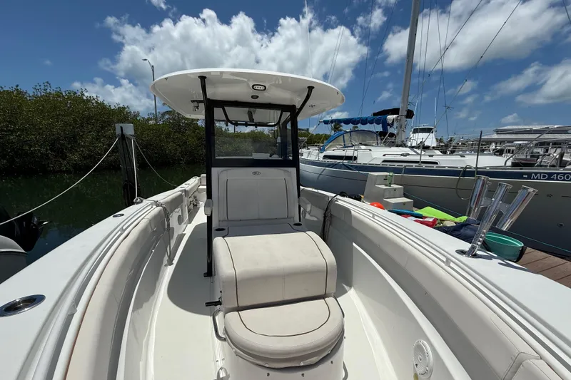 Afterthought Yacht Photos Pics 2022 Sea Hunt Gamefish 30 Coffin Box boat docked under blue sky.
