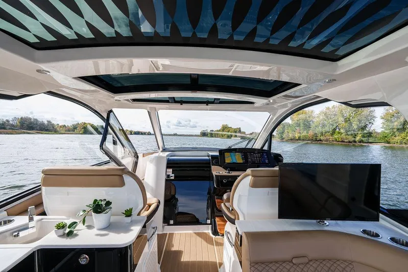  Yacht Photos Pics 2023 Sea Ray Sundancer 370 Outboard interior with modern design and scenic water view.