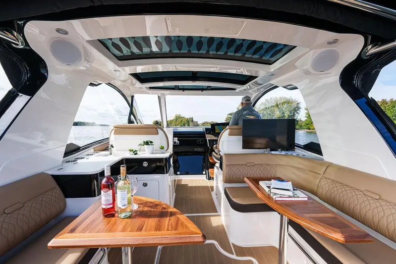  Yacht Photos Pics 2023 Sea Ray Sundancer 370 Outboard interior with luxurious seating and modern amenities.