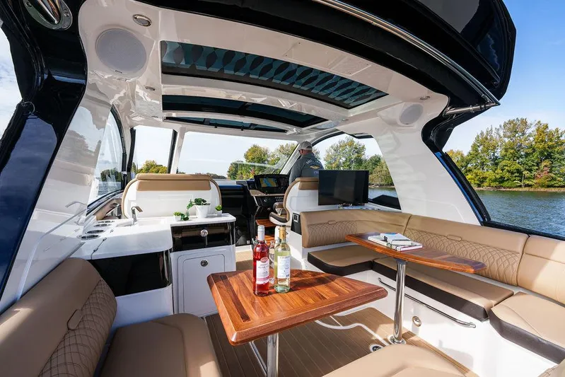  Yacht Photos Pics 2023 Sea Ray Sundancer 370 Outboard interior with luxurious seating and modern amenities.