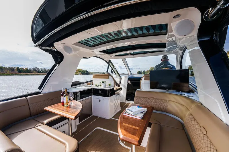  Yacht Photos Pics 2023 Sea Ray Sundancer 370 Outboard interior with luxurious seating and modern amenities.