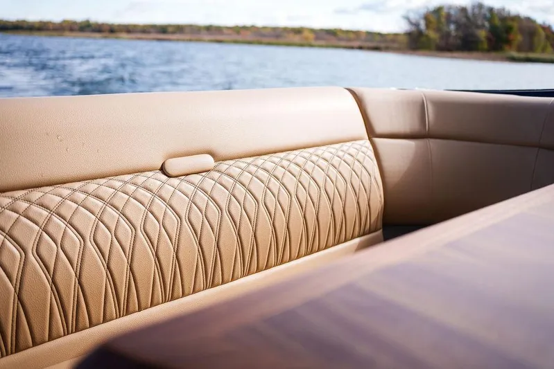  Yacht Photos Pics Luxurious seating on 2023 Sea Ray Sundancer 370 Outboard, overlooking serene water.