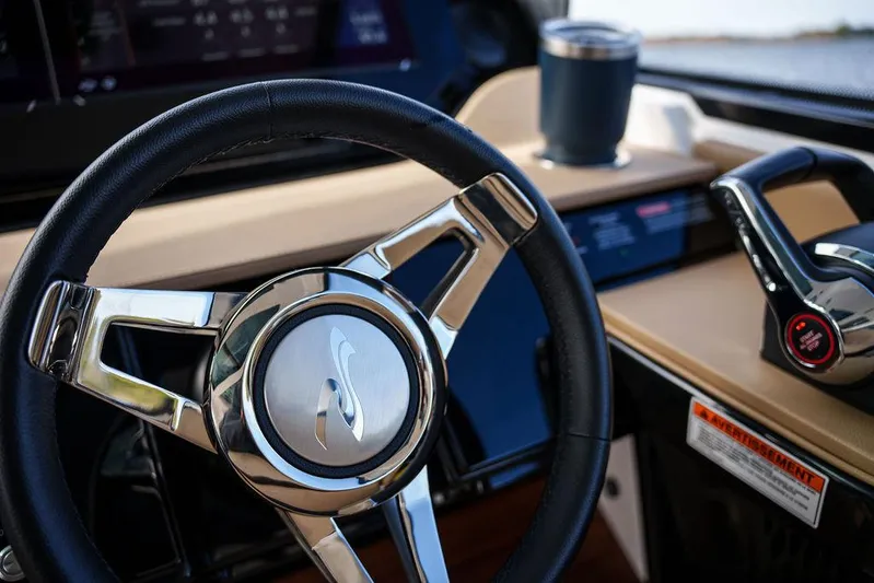  Yacht Photos Pics 2023 Sea Ray Sundancer 370 Outboard helm with steering wheel and controls.