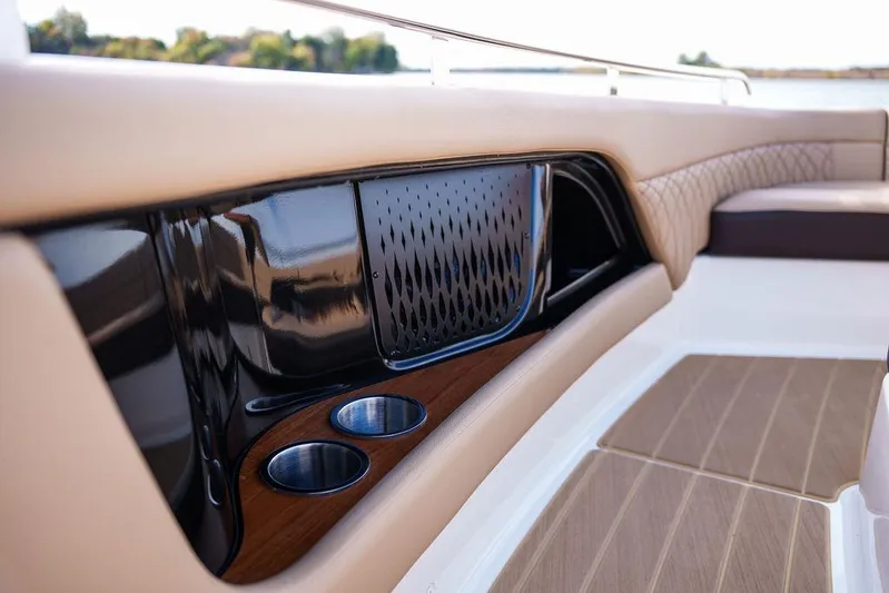  Yacht Photos Pics 2023 Sea Ray Sundancer 370 Outboard interior with cup holders and elegant seating.