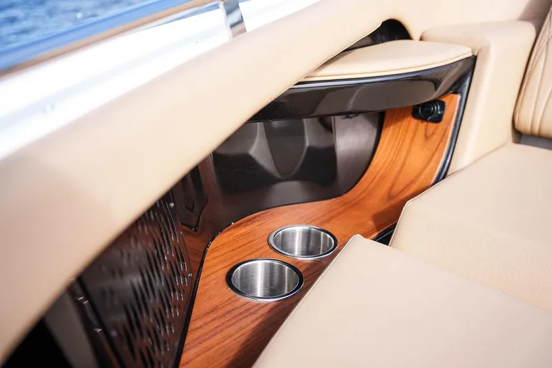  Yacht Photos Pics 2023 Sea Ray Sundancer 370 Outboard interior with wood accents and cup holders.