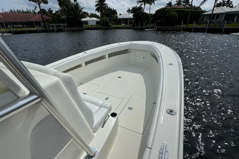  Yacht Photos Pics 2013 SeaVee 320B boat on calm water, showcasing spacious deck and seating.