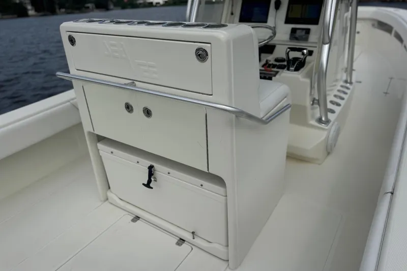  Yacht Photos Pics 2013 SeaVee 320B boat interior with helm station and storage compartments.