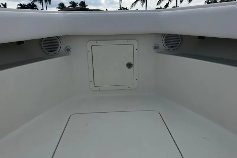 Yacht Photos Pics 2013 SeaVee 320B boat interior with storage compartment and speakers.