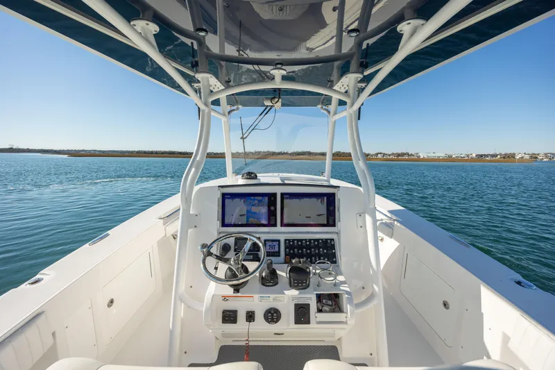 Seachosis Yacht Photos Pics 2014 Southport 29TE boat dashboard with navigation screens on open water.