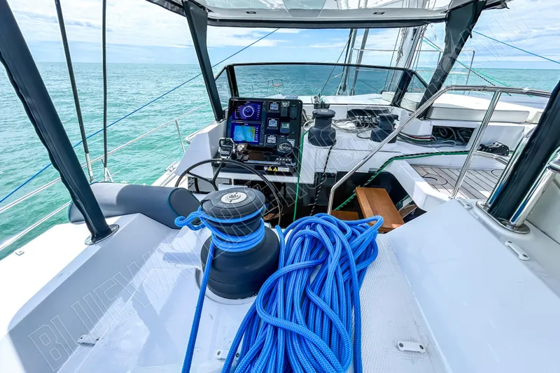 Fun Pass Yacht Photos Pics Luxury Privilege 580 yacht cockpit with navigation equipment and blue rope, 2025 model.