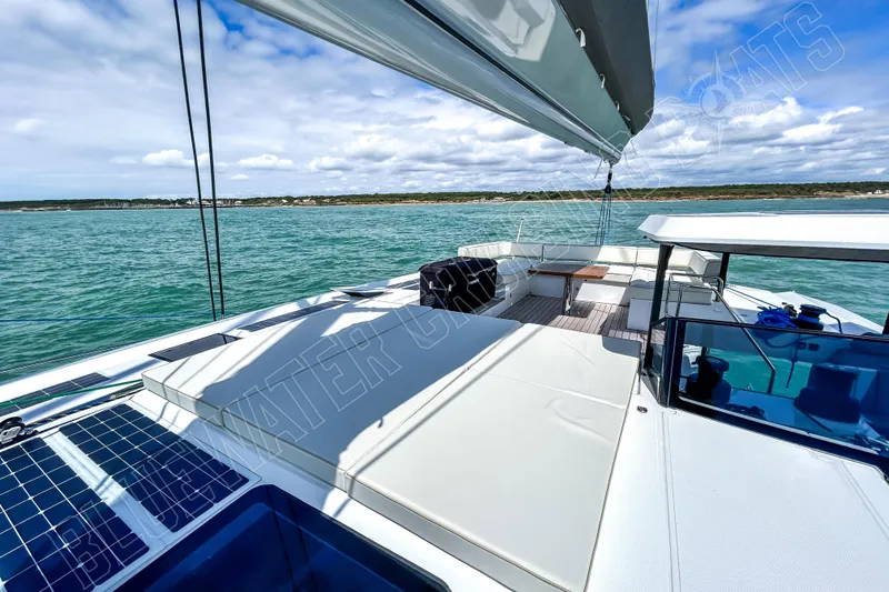 Fun Pass Yacht Photos Pics Luxury Privilege 580 yacht deck, 2025 model, cruising on serene blue waters.