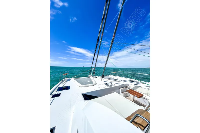 Fun Pass Yacht Photos Pics Luxury Privilege 580 yacht sailing on clear blue ocean, 2025 model.