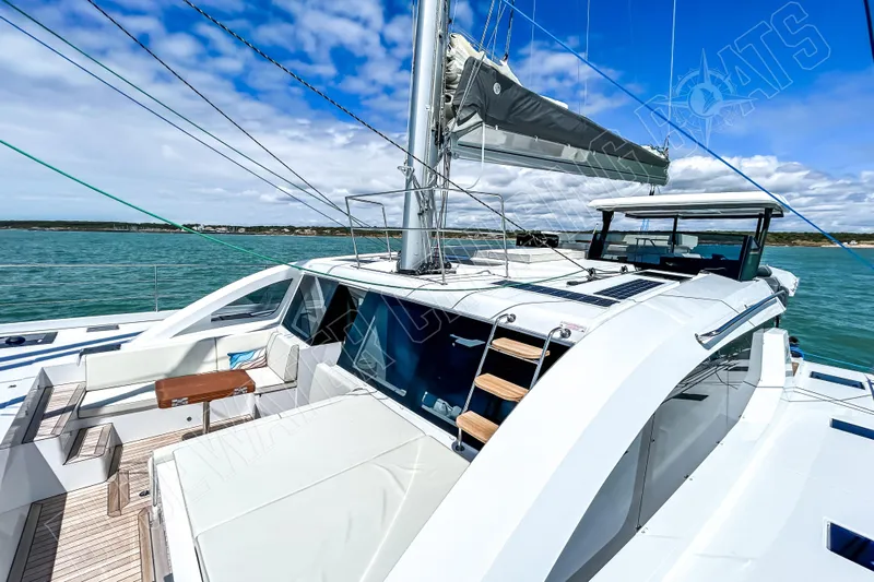 Fun Pass Yacht Photos Pics Luxury Privilege 580 yacht sailing on clear blue waters, 2025 model.