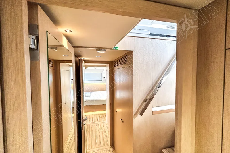 Fun Pass Yacht Photos Pics Interior of 2025 Privilege 580 yacht, featuring modern wood finishes and sleek design.