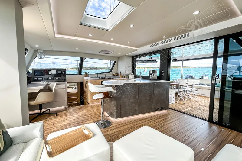 Fun Pass Yacht Photos Pics Luxurious interior of 2025 Privilege 580 yacht with modern design and ocean view.