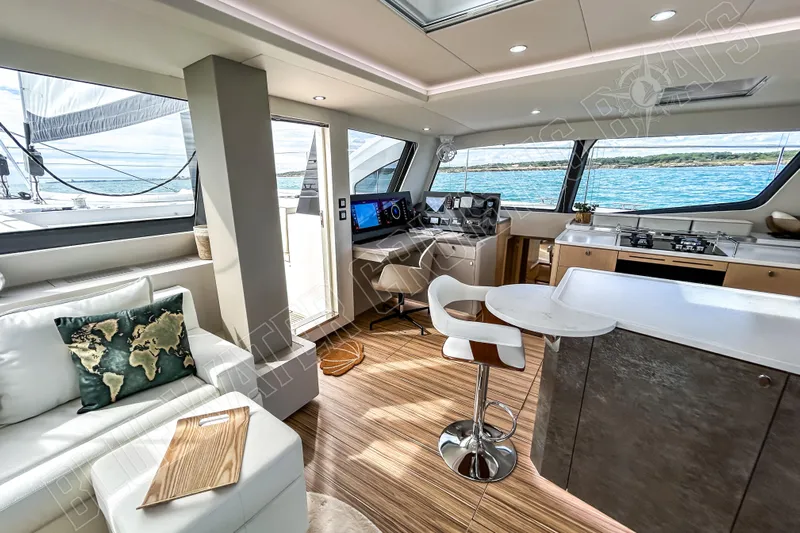 Fun Pass Yacht Photos Pics Luxurious interior of 2025 Privilege 580 yacht with modern design and ocean view.