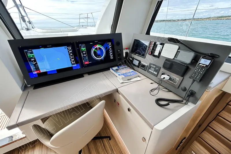 Fun Pass Yacht Photos Pics Modern navigation station on 2025 Privilege 580 yacht with advanced control panels.