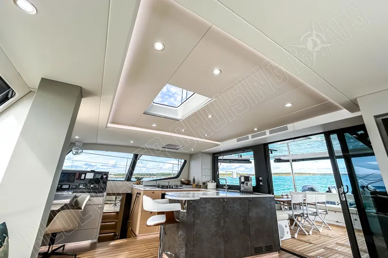 Fun Pass Yacht Photos Pics Luxurious interior of 2025 Privilege 580 yacht with modern design and ocean view.