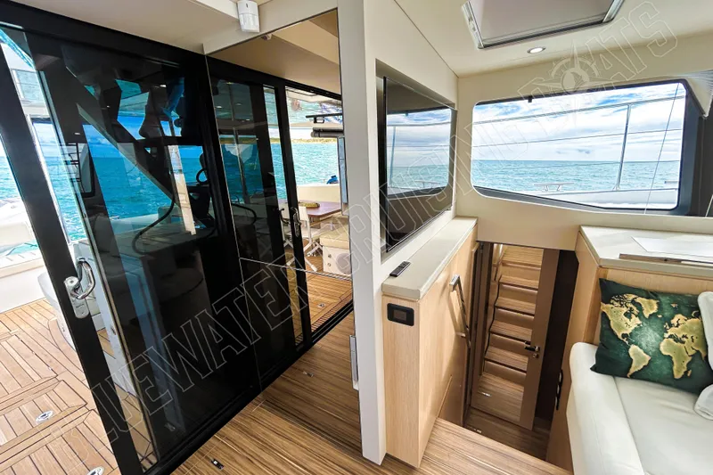 Fun Pass Yacht Photos Pics Luxurious interior of 2025 Privilege 580 yacht with ocean view and modern design.