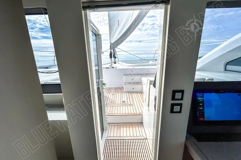 Fun Pass Yacht Photos Pics Interior view of 2025 Privilege 580 yacht, showcasing sleek design and ocean view.