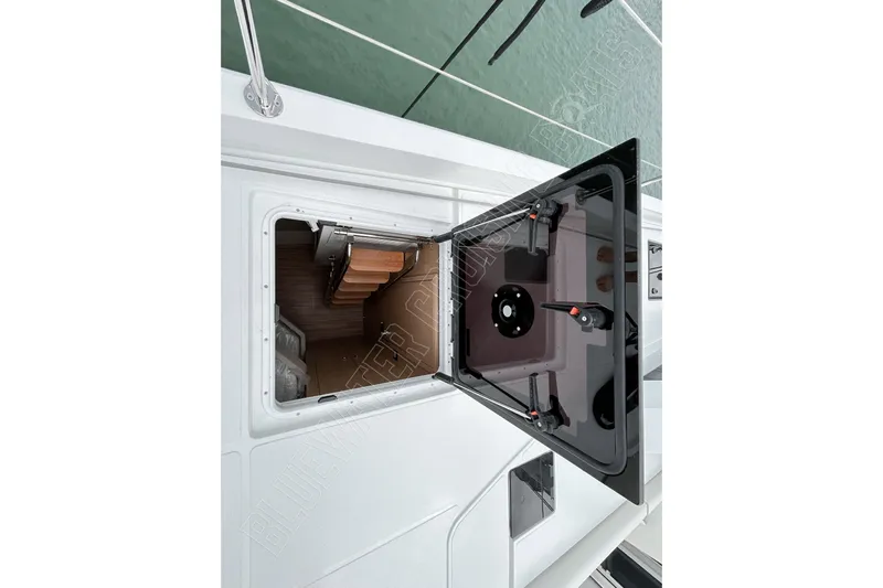Fun Pass Yacht Photos Pics Open hatch on Privilege 580 yacht, revealing interior stairs, 2025 model.