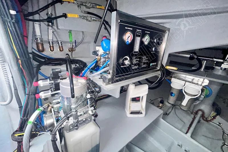 Fun Pass Yacht Photos Pics Engine room of 2025 Privilege 580 yacht with control panel and wiring.