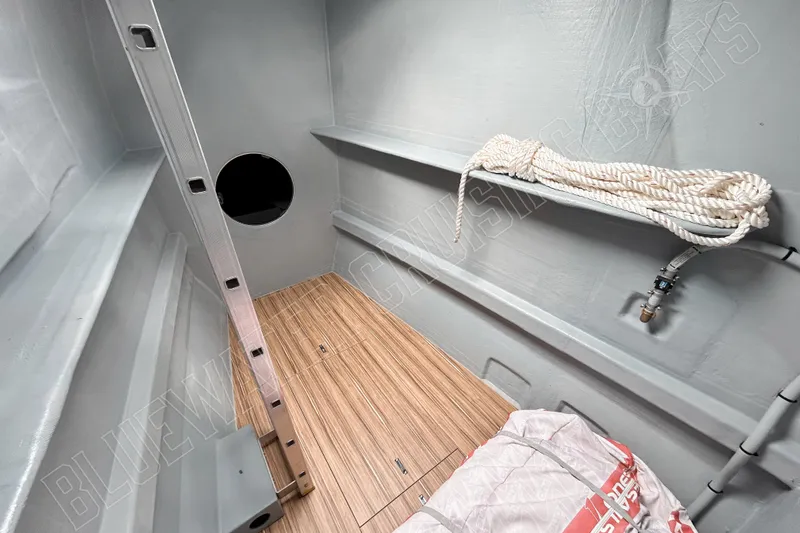 Fun Pass Yacht Photos Pics Interior of 2025 Privilege 580 yacht with wooden flooring and coiled rope.