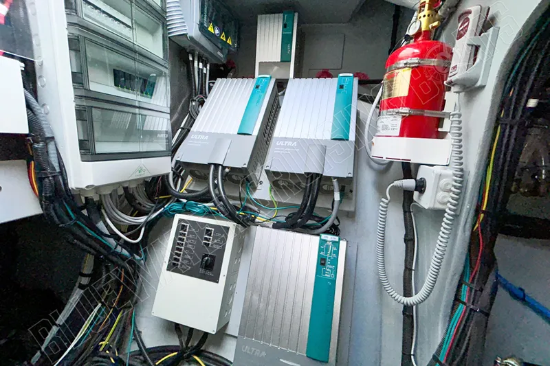 Fun Pass Yacht Photos Pics Electrical system setup in a Privilege 580 yacht, featuring advanced wiring and safety equipment.