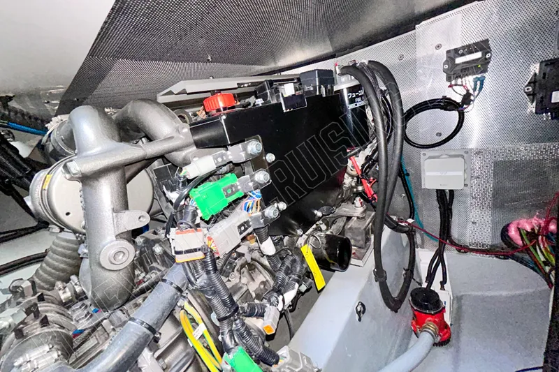 Fun Pass Yacht Photos Pics Engine room of 2025 Privilege 580 yacht, showcasing complex machinery and wiring.