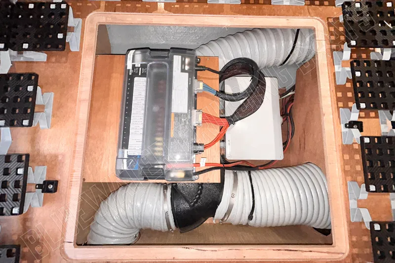 Fun Pass Yacht Photos Pics Electrical system components inside Privilege 580 yacht, 2025 model, with wiring and ventilation ducts.