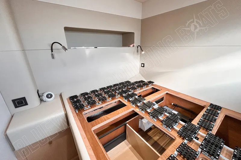 Fun Pass Yacht Photos Pics Interior of 2025 Privilege 580 yacht, showcasing modern design and storage compartments.