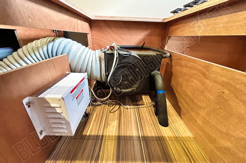 Fun Pass Yacht Photos Pics Engine compartment of 2025 Privilege 580 yacht with ventilation and electrical components.