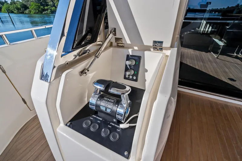 Sunsation Yacht Photos Pics Control panel on 2019 Ferretti Yachts 780, featuring engine controls and sleek design.