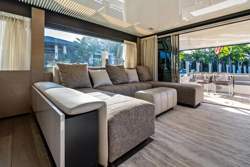 Sunsation Yacht Photos Pics Luxurious interior of 2019 Ferretti Yachts 780 with plush seating and elegant decor.