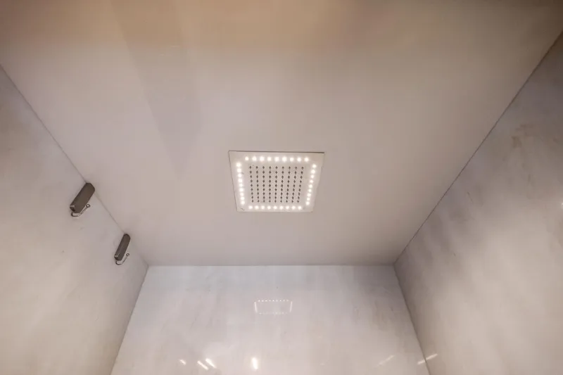 Sunsation Yacht Photos Pics Ceiling showerhead with LED lights in 2019 Ferretti Yachts 780 bathroom.