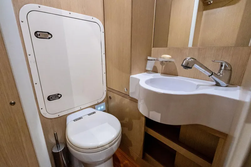 Sunsation Yacht Photos Pics Luxurious bathroom in 2019 Ferretti Yachts 780, featuring modern fixtures and elegant design.