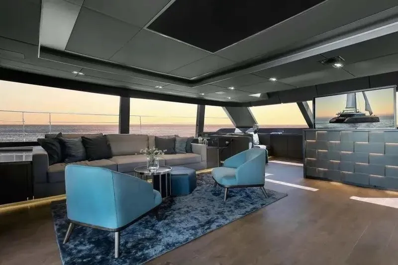  Yacht Photos Pics Luxurious interior of 2021 Sunreef 80 Power yacht with modern seating and ocean view.