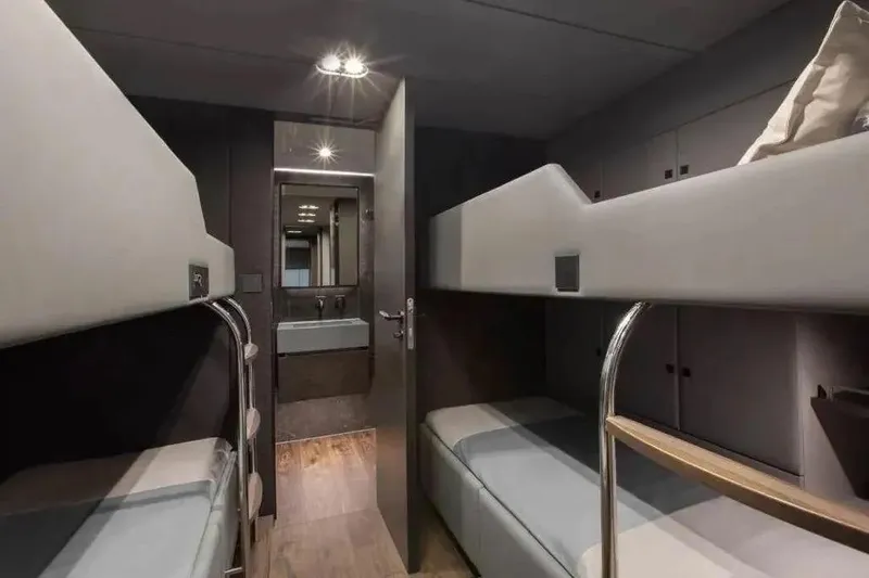  Yacht Photos Pics Interior of 2021 Sunreef 80 Power yacht with modern bunk beds and sleek design.