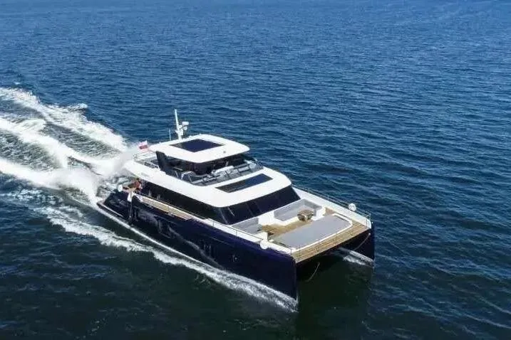  Yacht Photos Pics 2021 Sunreef 80 Power yacht cruising on open sea.