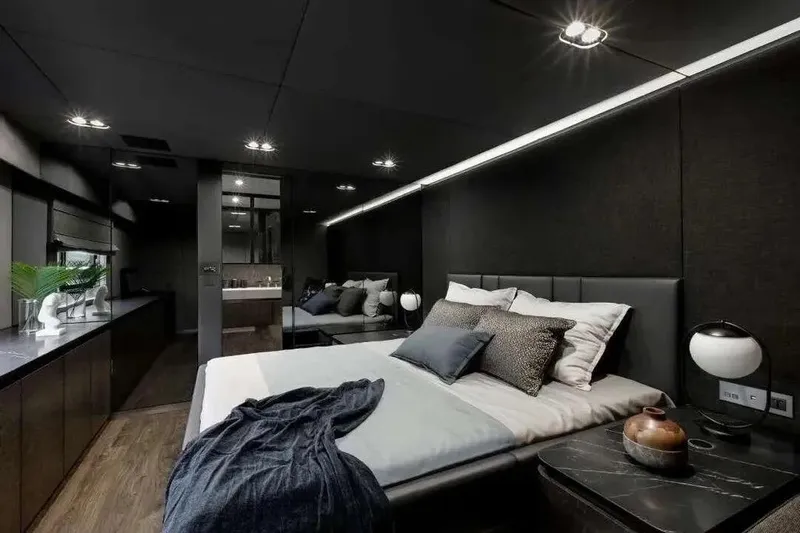  Yacht Photos Pics Luxurious bedroom interior on 2021 Sunreef 80 Power yacht, featuring modern design and elegant decor.