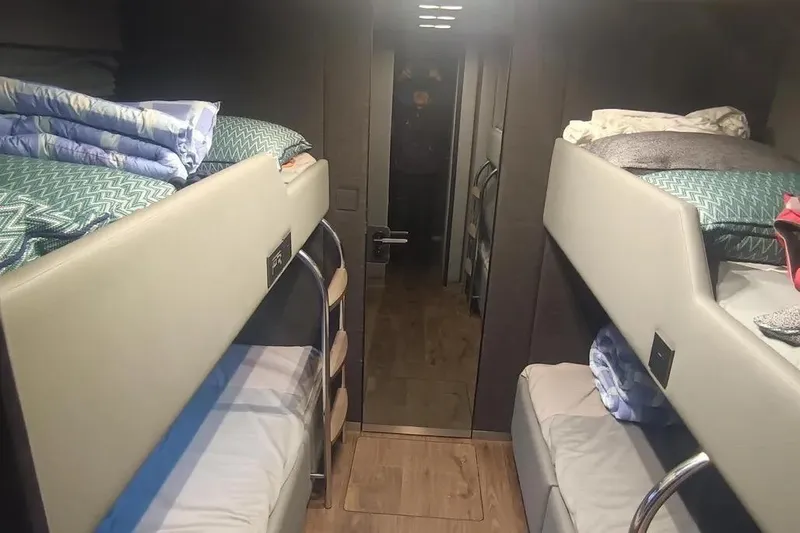  Yacht Photos Pics Interior of 2021 Sunreef 80 Power yacht with cozy bunk beds and modern design.